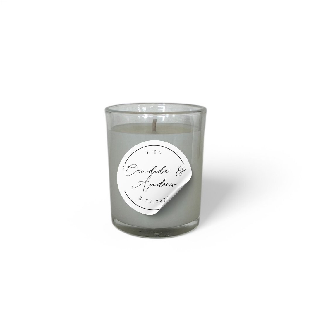 Elegant "I Do" votive candle with personalized names and date, set against a white background
