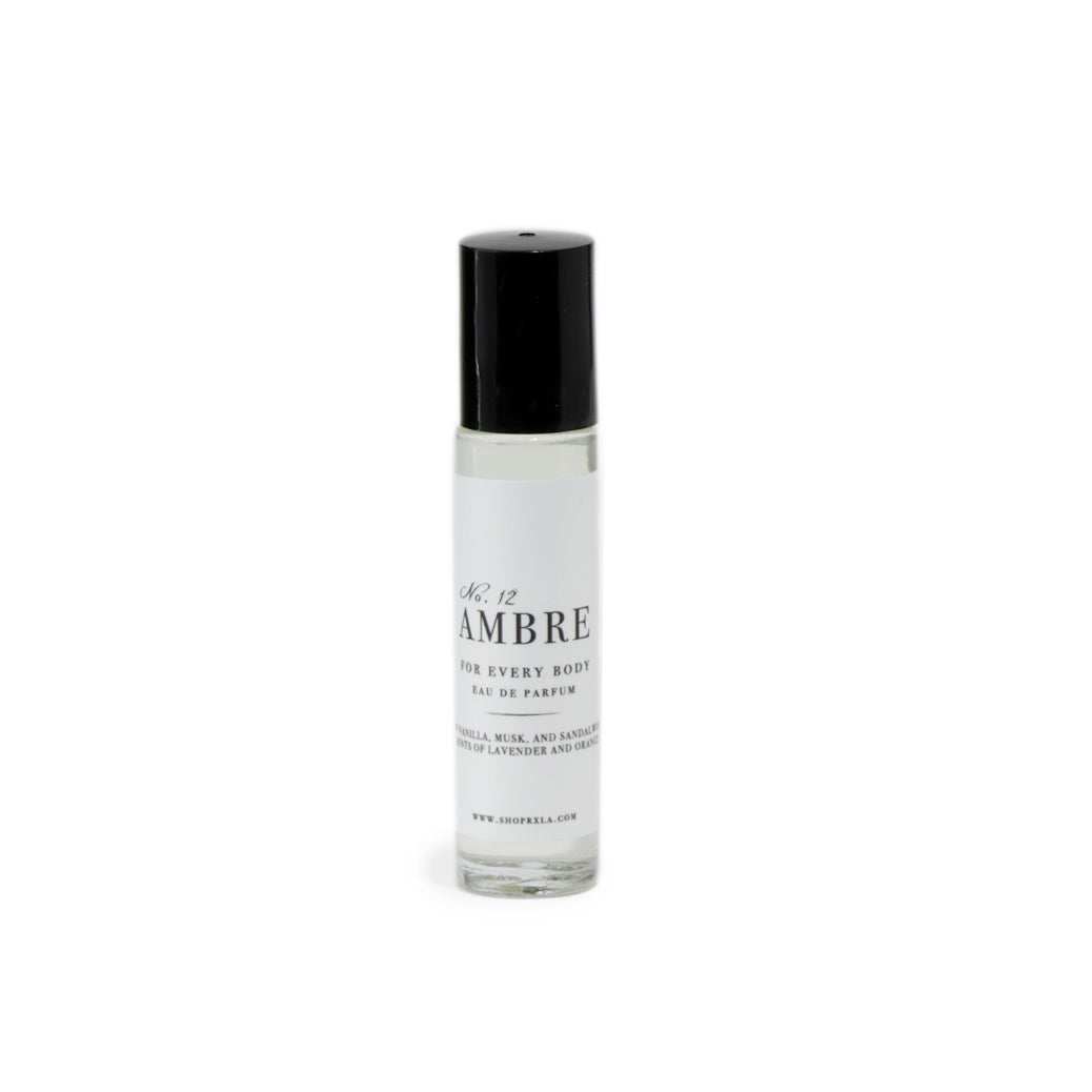 Elegant Ambre roll-on fragrance, perfect for layering or wearing solo.