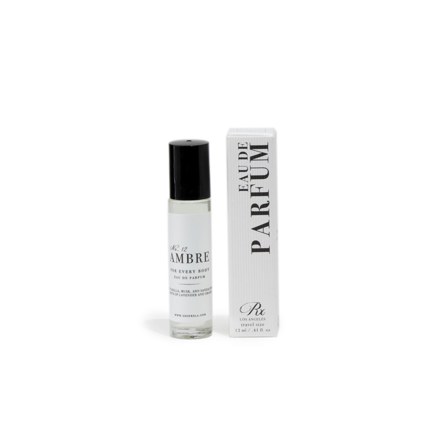 RXLA Ambre rollerball perfume, a warm and sensual blend of amber, musk, and golden vanilla in a sleek bottle.