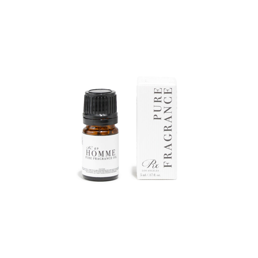RXLA Homme pure fragrance oil in a 5ml amber glass bottle. 100% pure, undiluted, perfect for creating bold, masculine perfumes, body oils, and candles.