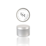 Elegant custom travel tin candle with wedding names and date, a perfect guest favor.