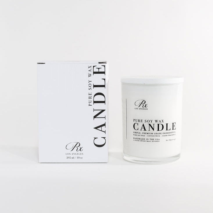 Pure soy wax candle with packaging on a white background