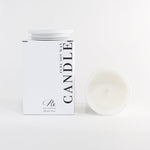 Candle with packaging on a white background
