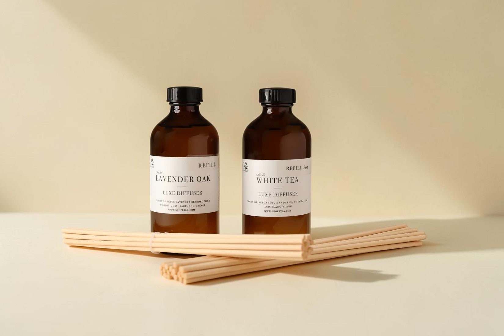 RXLA Refill Duo, two reed diffuser refill bottles with fiber reeds
