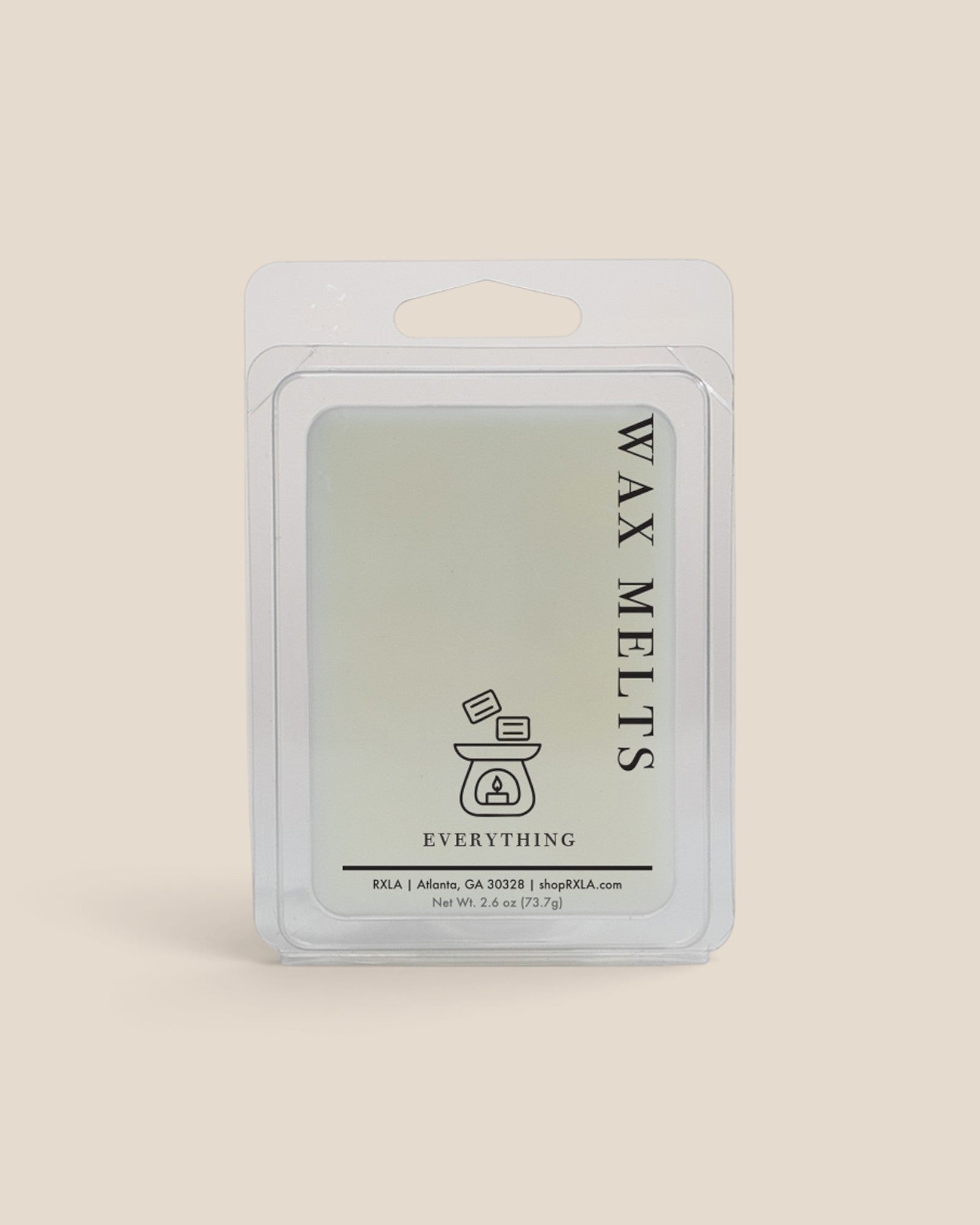 A wax melt package by Everything Essentials, featuring a clear plastic clamshell over a pale sage green wax melt, set against a solid beige background.