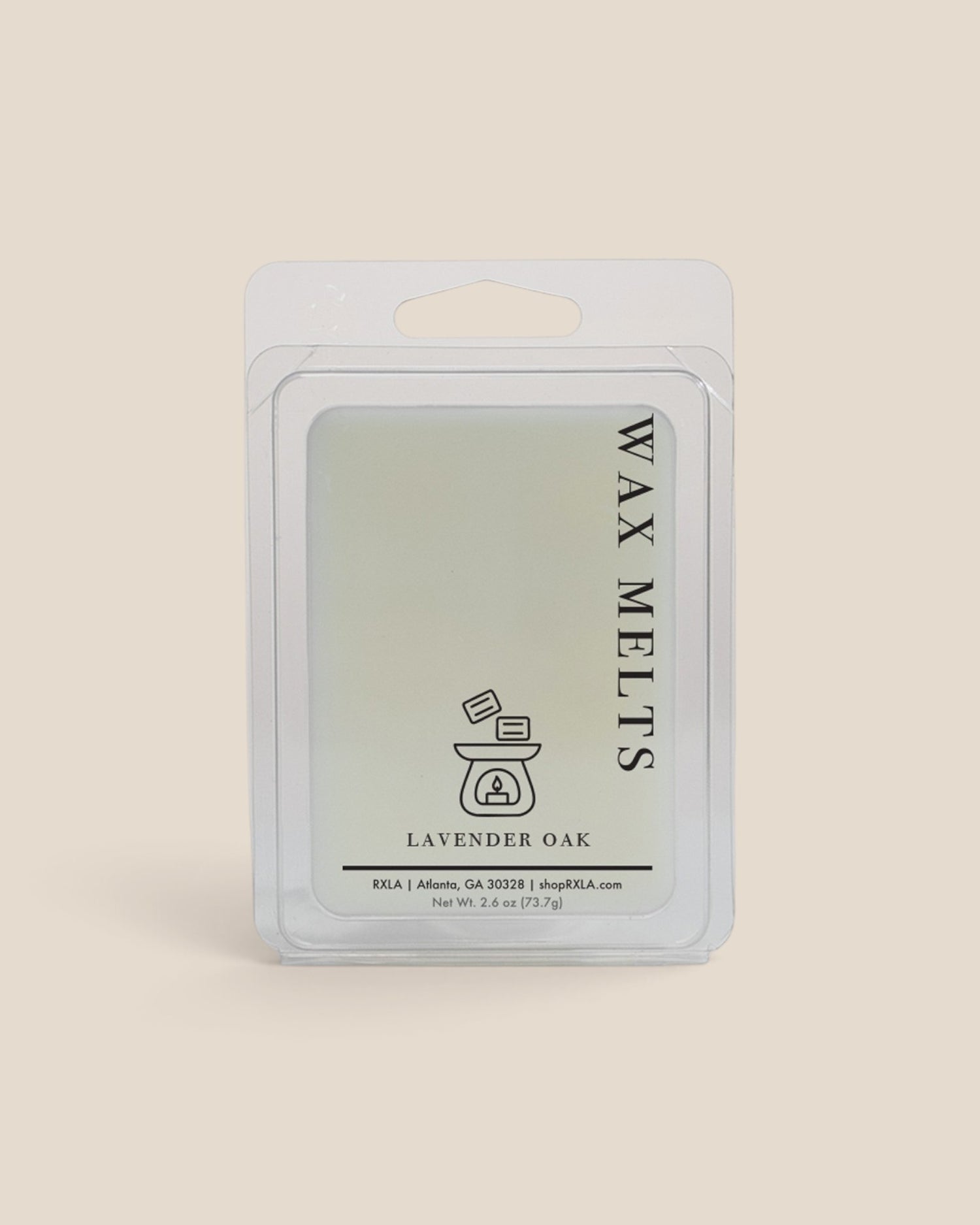 A wax melt package labeled 'WAX MELTS' and 'LAVENDER OAK' in a clear plastic clamshell with a white backing card, centered on a warm beige background.