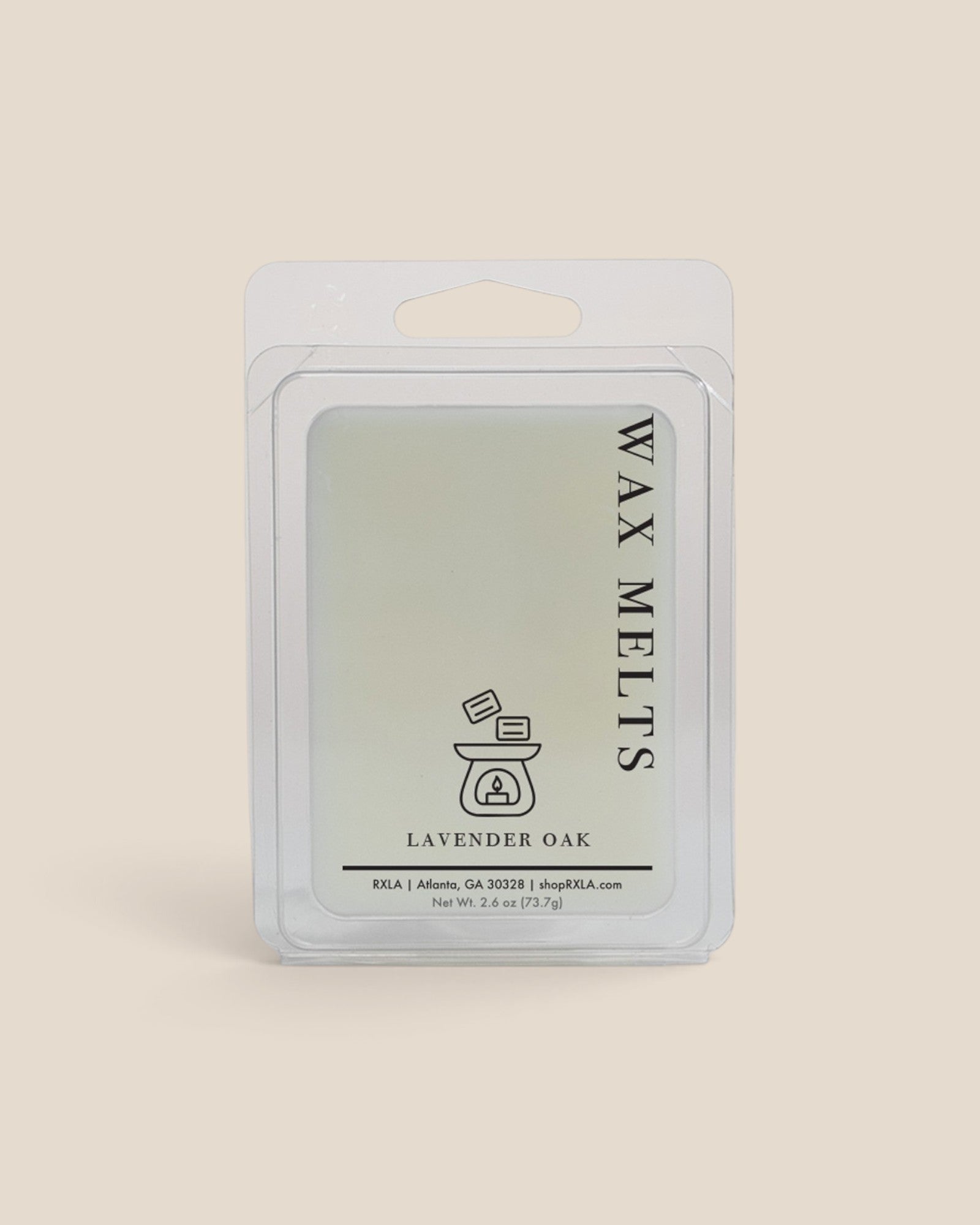 A wax melt package labeled 'WAX MELTS' and 'LAVENDER OAK' in a clear plastic clamshell with a white backing card, centered on a warm beige background.