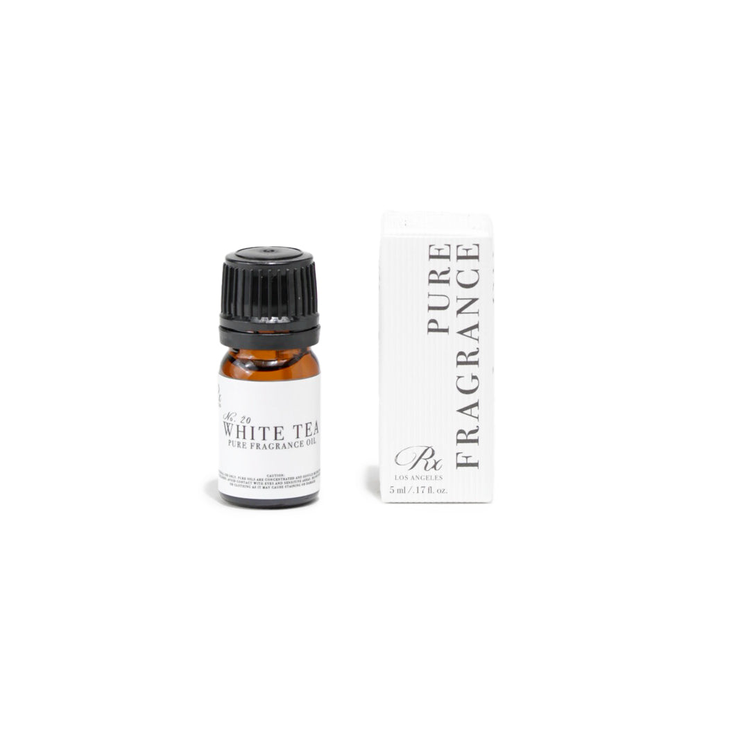 RXLA White Tea pure fragrance oil in a 5ml amber glass bottle. 100% pure, undiluted, perfect for creating fresh, crisp perfumes, body oils, and candles.