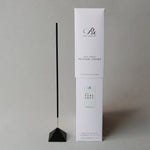 Incense burning quietly in a peaceful space—Earl Grey fragrance fills the room with warmth, clarity, and calm.