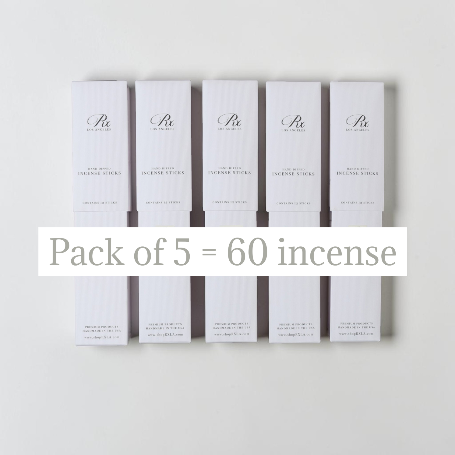 Five white rectangular boxes of incense sticks arranged in two rows on a light gray background, with a white text banner across the center reading 'Pack of 5 = 60 incense'.
